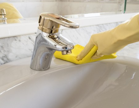 Professional cleaning team maintaining a Westminster office kitchen and communal area